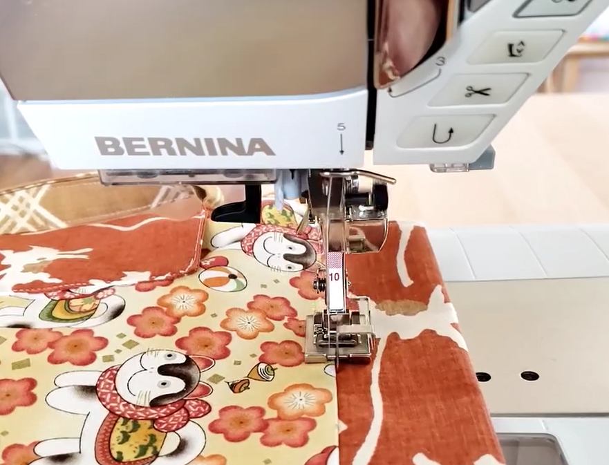 BERNINA sewing machine using the #10 presser foot on a fabric project