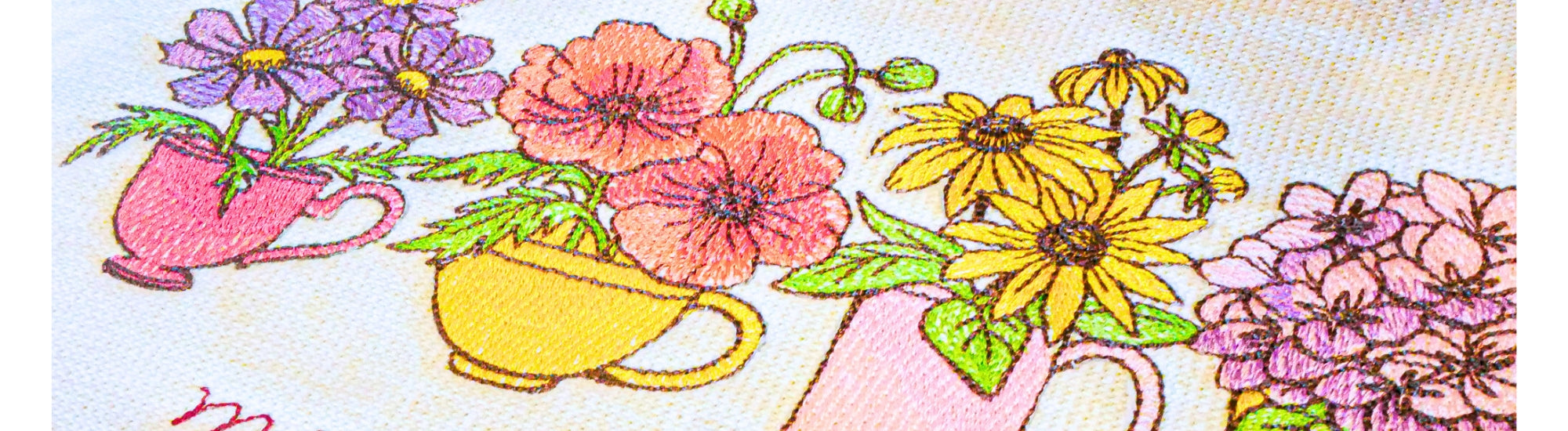 Colorful embroidery  of flowers and teacups on a textured background