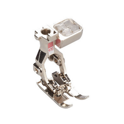 Sewing machine presser foot on a white background