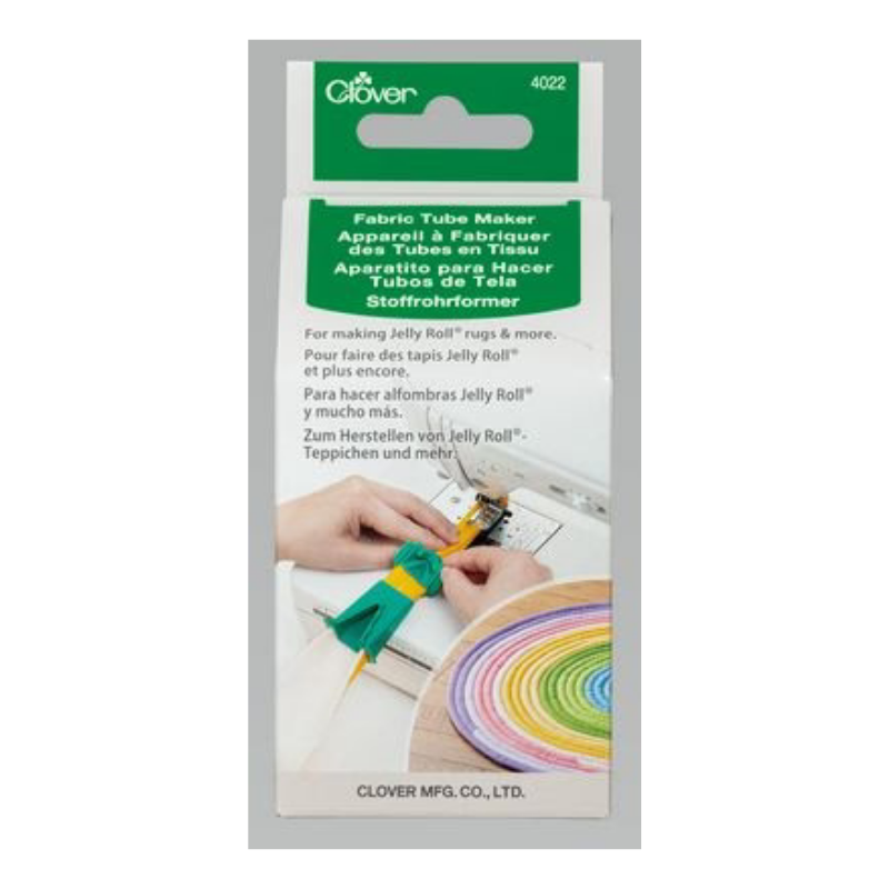 Clover fabric tube maker packaging with a hand using the tool and a rainbow-colored fabric tube.