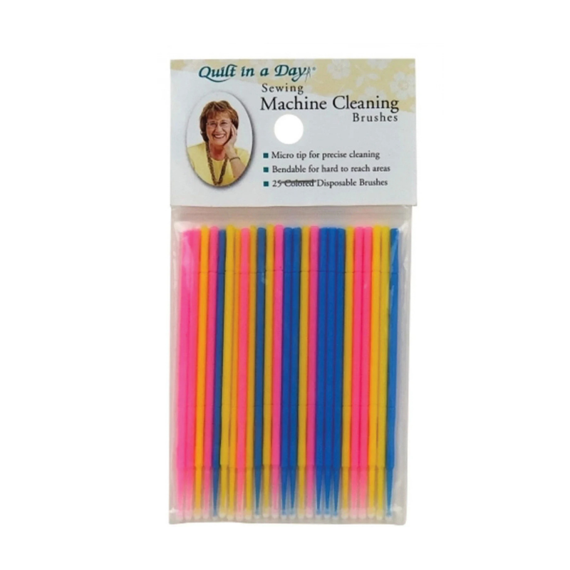 Pack of sewing machine cleaning brushes with colorful handles on a white background