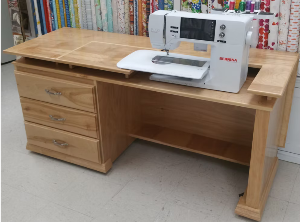 Bernina sewing machine on a wood table in an indoor setting