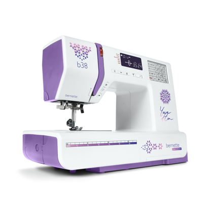 White and purple sewing machine with digital display on a white background